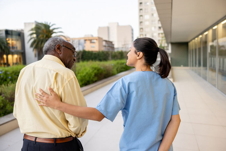 social worker walking with client