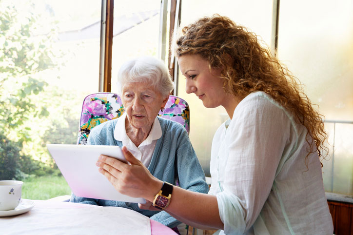 licensed social worker helping elderly